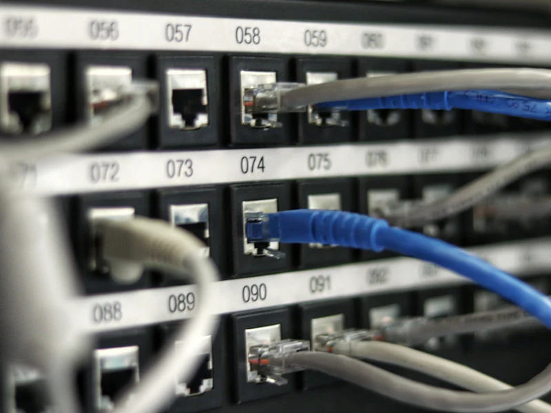 48-port PoE+ managed switch — 4× 10G SFP+